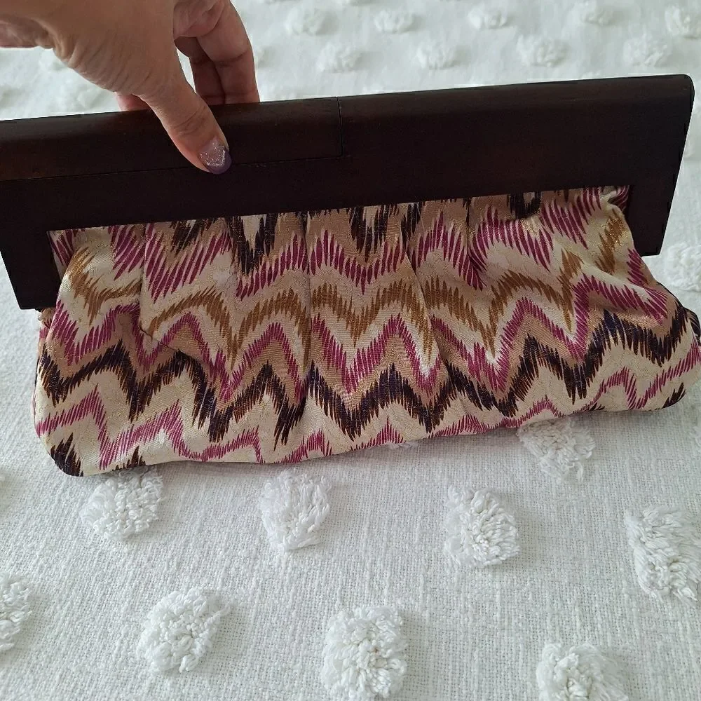 Aldo clutch shimmery multicolor fabric with wood handle